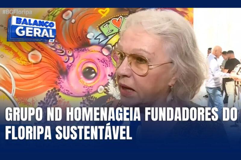 Mulher é entrevistada em evento com mural colorido ao fundo. Texto destaca homenagem ao Floripa Sustentável.